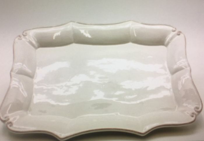 Vassoio in ceramica bianca con bordo sagomato